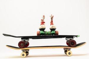 Rollerskates on skateboard photo