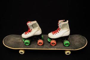 Rollerskates on skateboard photo