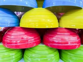 Closeup and crop colorful noodle bowls  stacked fit on screen background and wallpaper. photo