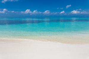 Freedom beach. Closeup white sand, calm blue sea, sunny sky. Seascape horizon. Beautiful outdoor nature scenic, tropical Mediterranean ocean shore. Beautiful tranquil coastline, relax island paradise. photo