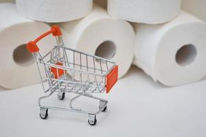 Toilet paper roll in a shopping trolley photo