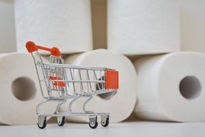 Toilet paper roll in a shopping trolley photo