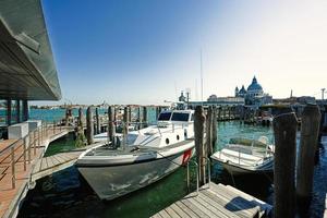 Yacht in Grand Canal against Basilica Santa Maria della Salute, Venice, Italy photo