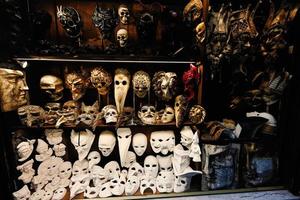Venetian masks in store display in Venice, Italy. photo