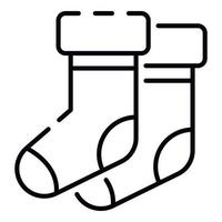 Winter socks icon, outline style vector