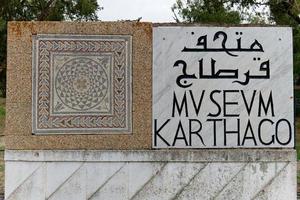 Sign marking the way to the Carthage National Museum  in Tunisia. Unesco World Heritage Site. Archaeological Site of Carthage. Place of historic interest. Ancient. photo