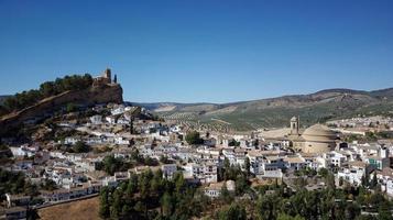 Aerial drone view of the white village Montefrio considered to be one of National Geographic's Best Views In The World. Touristic destination. Holidays and vacation. Travel the world. photo