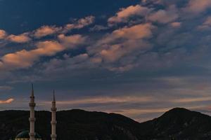 Early morning. Sunrise illuminates the minarets, the beginning of winter and the rainy season on the mediterranean coast photo