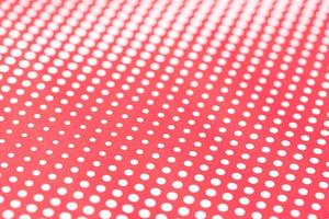 Red and white abstract background. Halftone pattern paper design. Selective focus photo