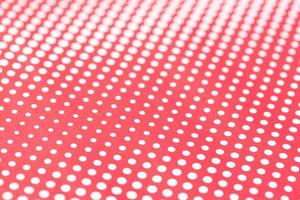 Red and white abstract background. Halftone pattern paper design. Selective focus photo