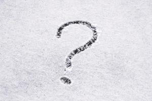 Question mark written on the snow photo