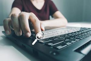 SEO Search engine optimization, Search technology, women's hands using a computer keyboard to search for information, using websites search bar to find the desired information or shopping online. photo