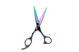 Rainbow color barber scissors isolated on white backgroud photo
