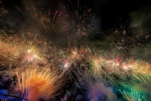 fireworks from Vijit Chao Phraya on Buddhayodfa Chulalok Maharat Bridge, Bangkok, Thailand. photo