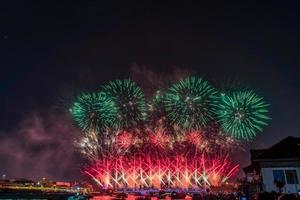 Colorful fireworks from Vijit Chao Phraya on Buddhayodfa Chulalok Maharat Bridge, Bangkok, Thailand. photo