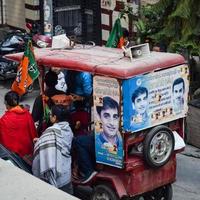 New Delhi, India, November 20 2022 - Bharatiya Janata Party BJP supporters during a rally in support of BJP candidate Pankaj Luthara to file nomination papers ahead of MCD local body Elections 2022 photo