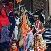 New Delhi, India, November 20 2022 - Bharatiya Janata Party BJP supporters during a rally in support of BJP candidate Pankaj Luthara to file nomination papers ahead of MCD local body Elections 2022 photo