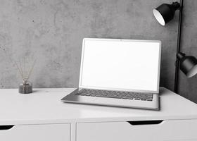 Laptop with blank white screen on white table at home or in office. Computer mockup. Free space for app, game, web site presentation. Modern interior with concrete wall, black lamp. 3D rendering. photo