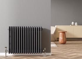 Heating radiator on gray wall in modern room. Home interior. Central heating system. Heating is getting more expensive. Energy crisis. 3D rendering.