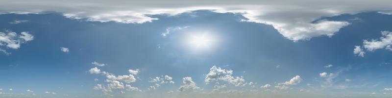 blue sky with beautiful clouds as seamless hdri 360 panorama view with zenith in spherical equirectangular format for use in 3d graphics or game development as sky dome or edit drone shot photo