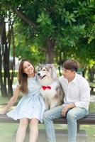 Asian couple love with dog photo