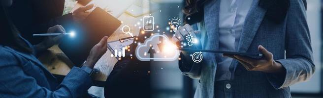 man use Laptop with cloud computing diagram show on hand. Cloud technology. Data storage. Networking and internet service concept. photo