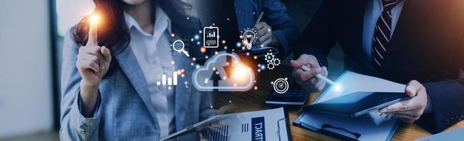 man use Laptop with cloud computing diagram show on hand. Cloud technology. Data storage. Networking and internet service concept. photo