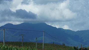 The beautiful mountains view with the cloudy sky and valley among them photo