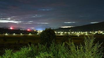 The bluetime city view with the lights on at night photo