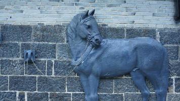 The old stone statue along the road in China photo