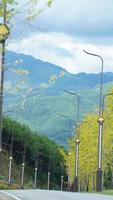 The beautiful mountains view with the cloudy sky and valley among them photo