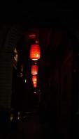 The red lantern hanging up in the old classical Chinese building for the festiveal bless photo