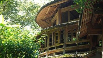 The old wooden Chinese buildings with the sculptures on them photo