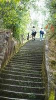 The steep stairs used to climb the mountains in the countryside of the China photo