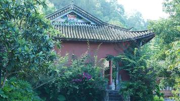 The old temple view with the ancient Chinese buildings located on the top of the mountains photo