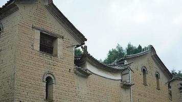 The old Chinese village view with the old built architectures in it photo