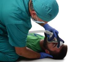 medical team giving CPR to patient. isolated photo