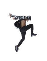 Cool young break dancer performing in studio on white background. photo