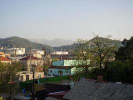 View of the southern city with mountains. Beautiful cityscape. Small town. photo