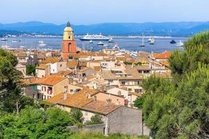 Scenic view of Saint Tropez in summer day light against blue sky photo