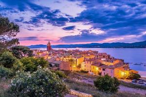 Night fall over Saint Tropez in south of France, scenic view with dramatic sky photo