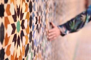 Scenic view of hand touching wall in Marrakesh touristic spot in Morocco