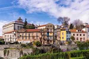 Scenic view of the city of Porto in Portugal against dramatic autumn sky photo