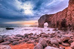 Scenic view of sea against sky with Arche de Port Blanc in Brittany, France photo