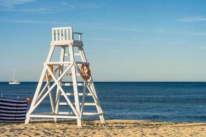 Scenic view of lifeguard chair at the Pampelone beach in Saint Tropez against Mediterranean sea in daylight photo