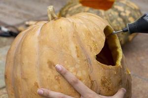 Glowing Halloween Pumpkin isolated on white background photo