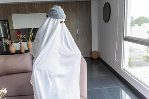 ghost with sparkling hat, ghost with sheet and sunglasses with halloween theme, mexico photo