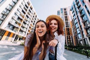 Two women are looking at the camera photo