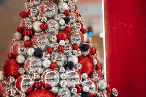 Christmas tree made of bauble decoration. New year concept. photo