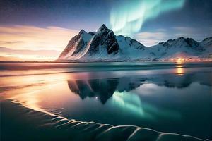 Aurora borealis over the sea, snowy mountains and city lights at night photo